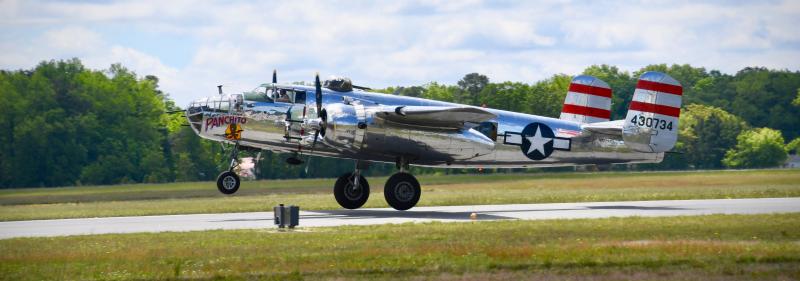 Panchito, a World War II-era B-25 Mitchell bomber, takes off from Delaware Coastal Airport to lead a countywide flyover to support frontline workers in the COVID-19 health crisis. RON MACARTHUR PHOTOS